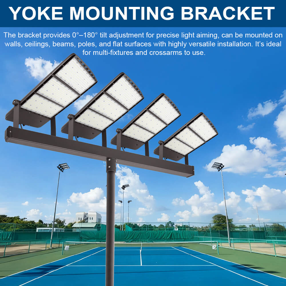 Konlite Spica 600W LED Tennis court lights with Yoke mounting bracket on a tennis court with a blue sky background