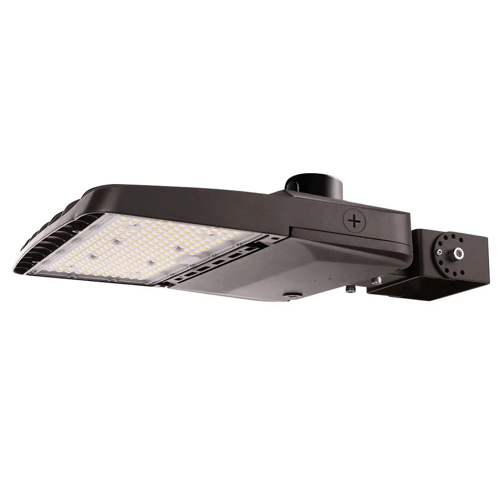 Wattage selectable Vela LED Area light with yoke arm