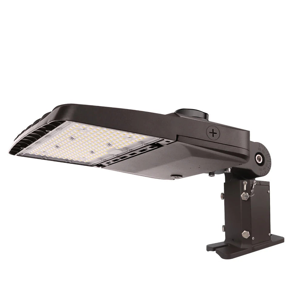 Wattage selectable Vela LED Area light with pole arm