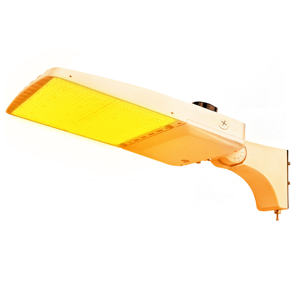 Vela Amber LED Area Light in white with extrusion arm and shorting cap.