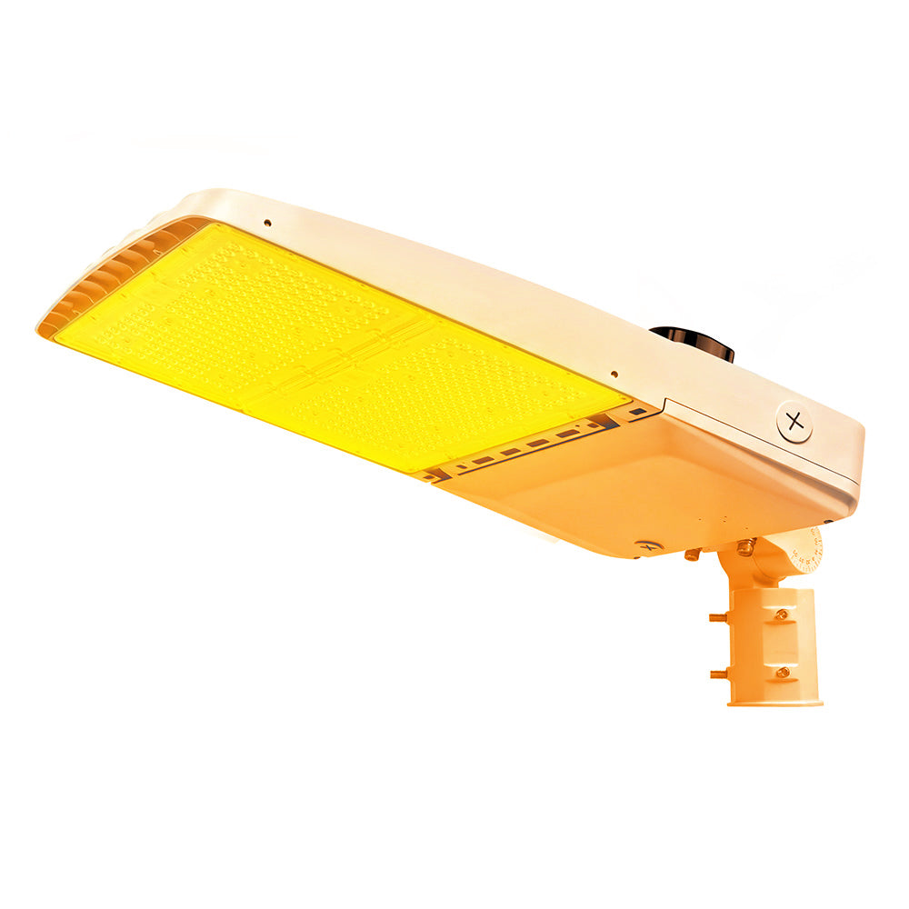 Vela Amber LED Area Light in white with slipfitter and shorting cap.
