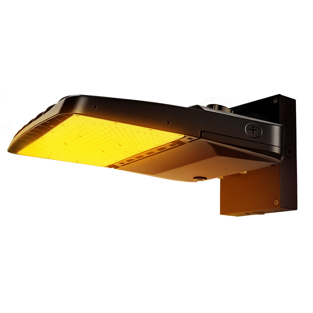 Vela Amber LED Area Light in black with wall mount and shorting cap