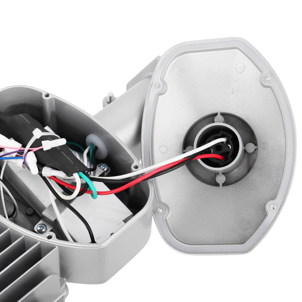 Close-up of a led barn light with a black dusk to dawn photocell