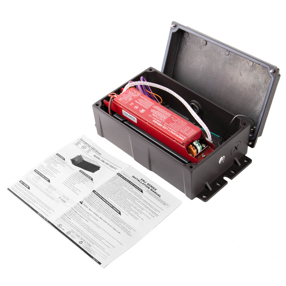 Electrical junction box with red battery and wiring, accompanied by a manual on a white background