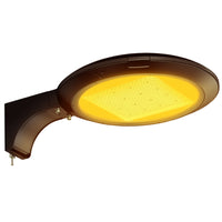 Atria Turtle Friendly Amber Area Light with Extrusion Arm Mounting in Dark Bronze finish.