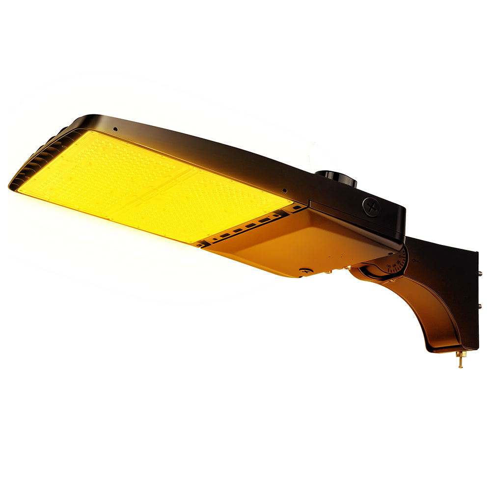 Vela Amber LED Area Light in black with extrusion arm and shorting cap.