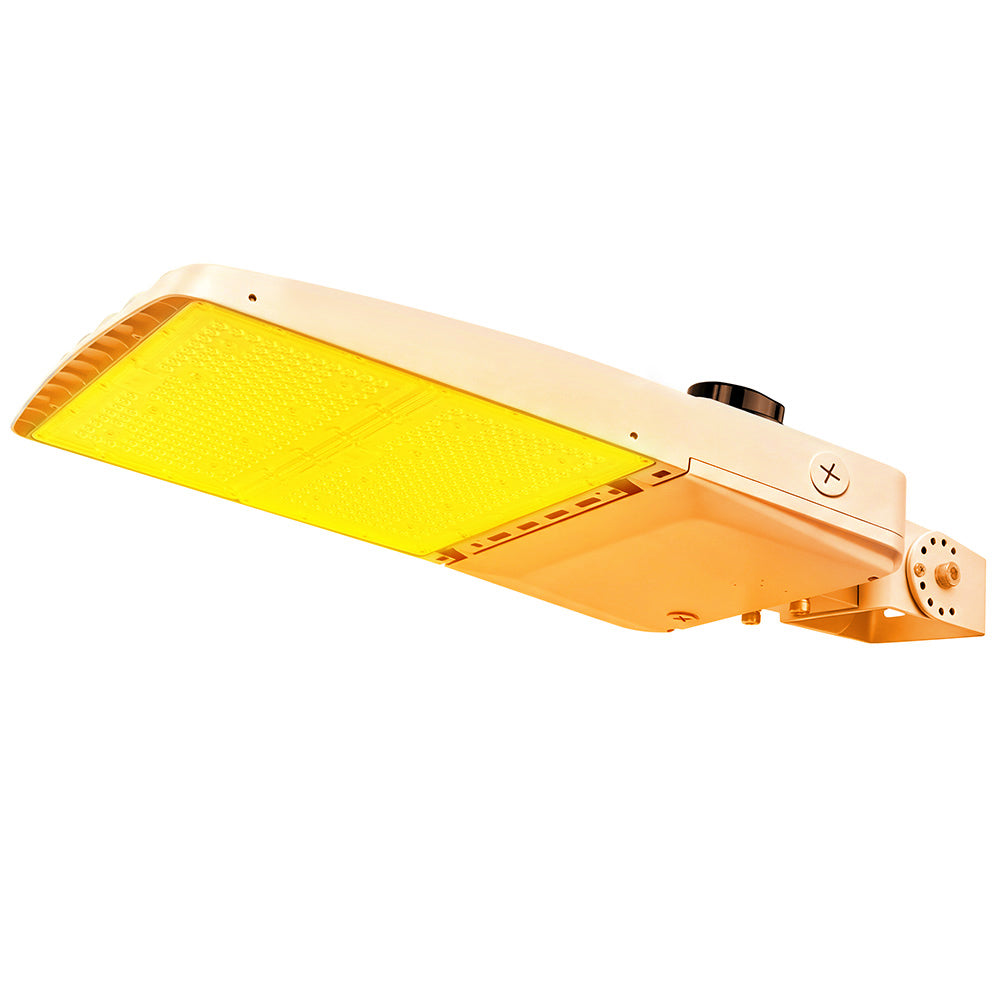 Vela Amber LED Area Light in white with yoke mount and shorting cap.