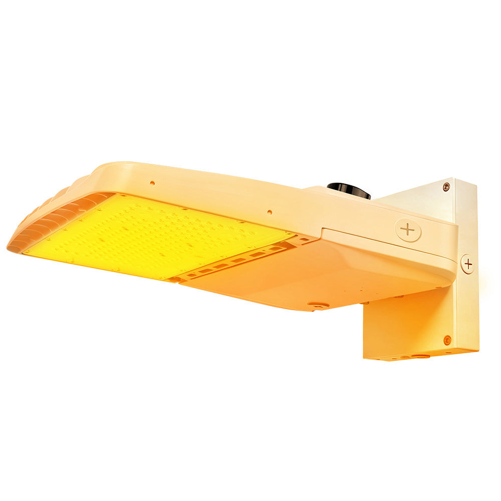 Vela Amber LED Area Light in white with wall mount and shorting cap