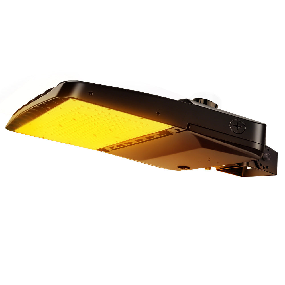 Vela Amber LED Area Light in black with yoke mount and shorting cap